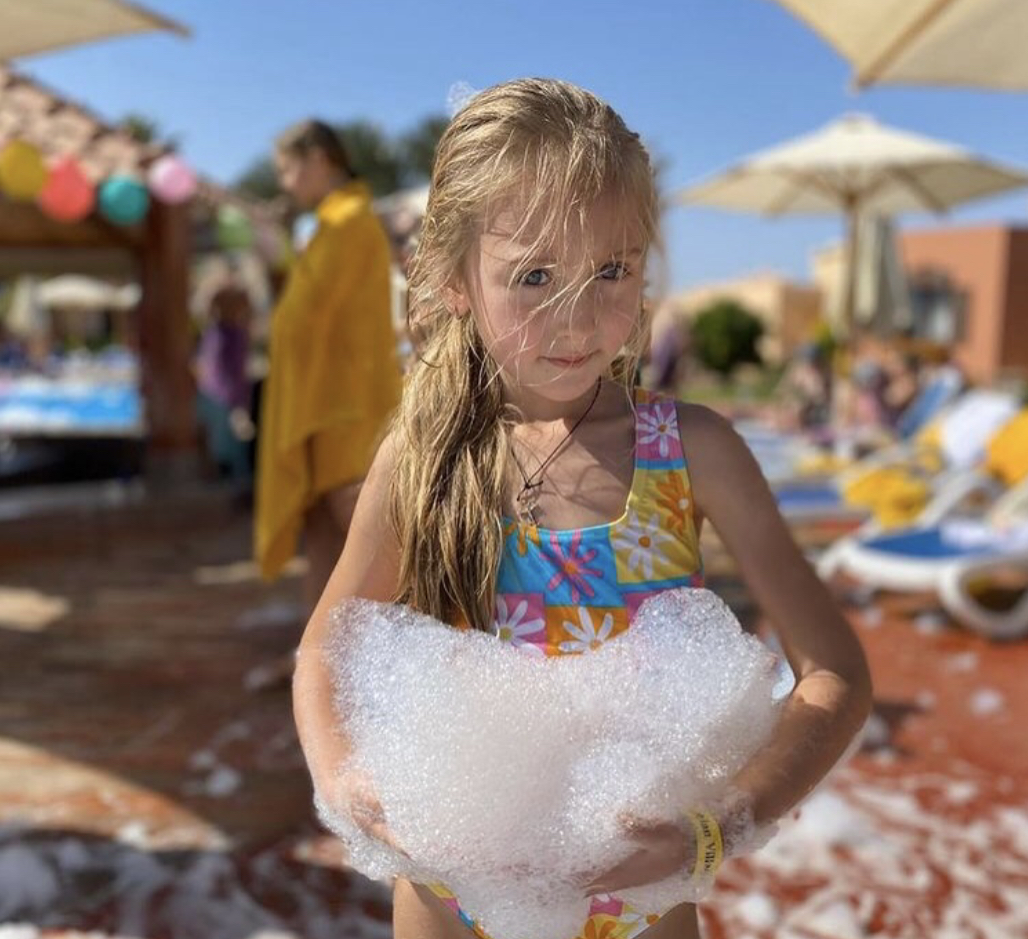 Girl enjoying foam